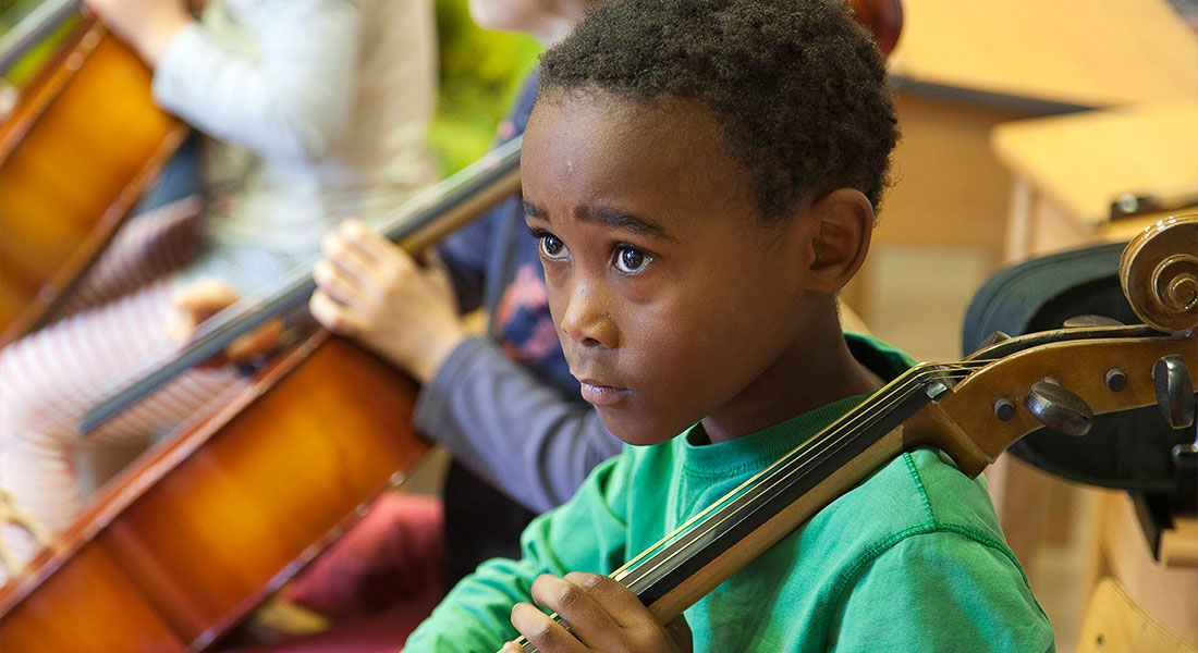 Boy playing cello